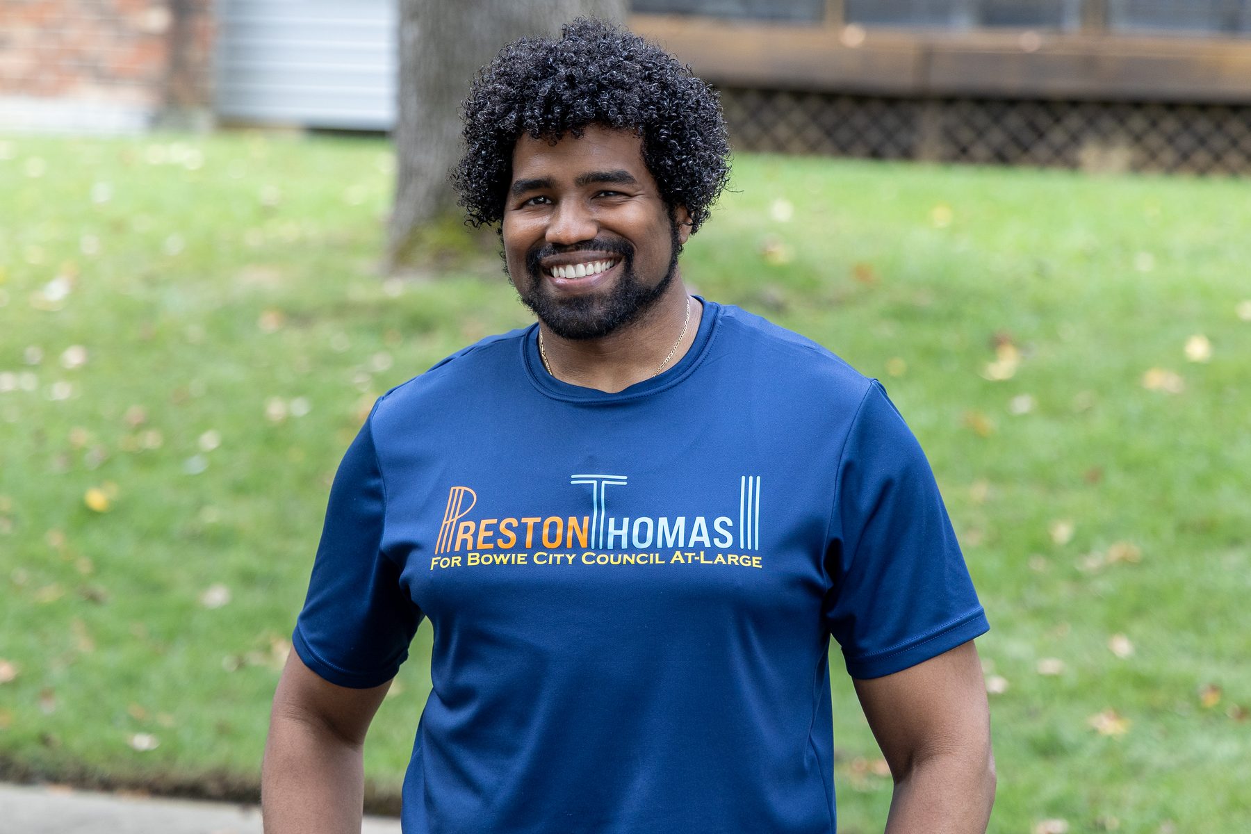 Preston Thomas smiling in a Preston Thomas campaign shirt